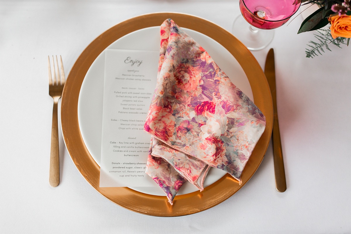 Floral napkin with gold charger