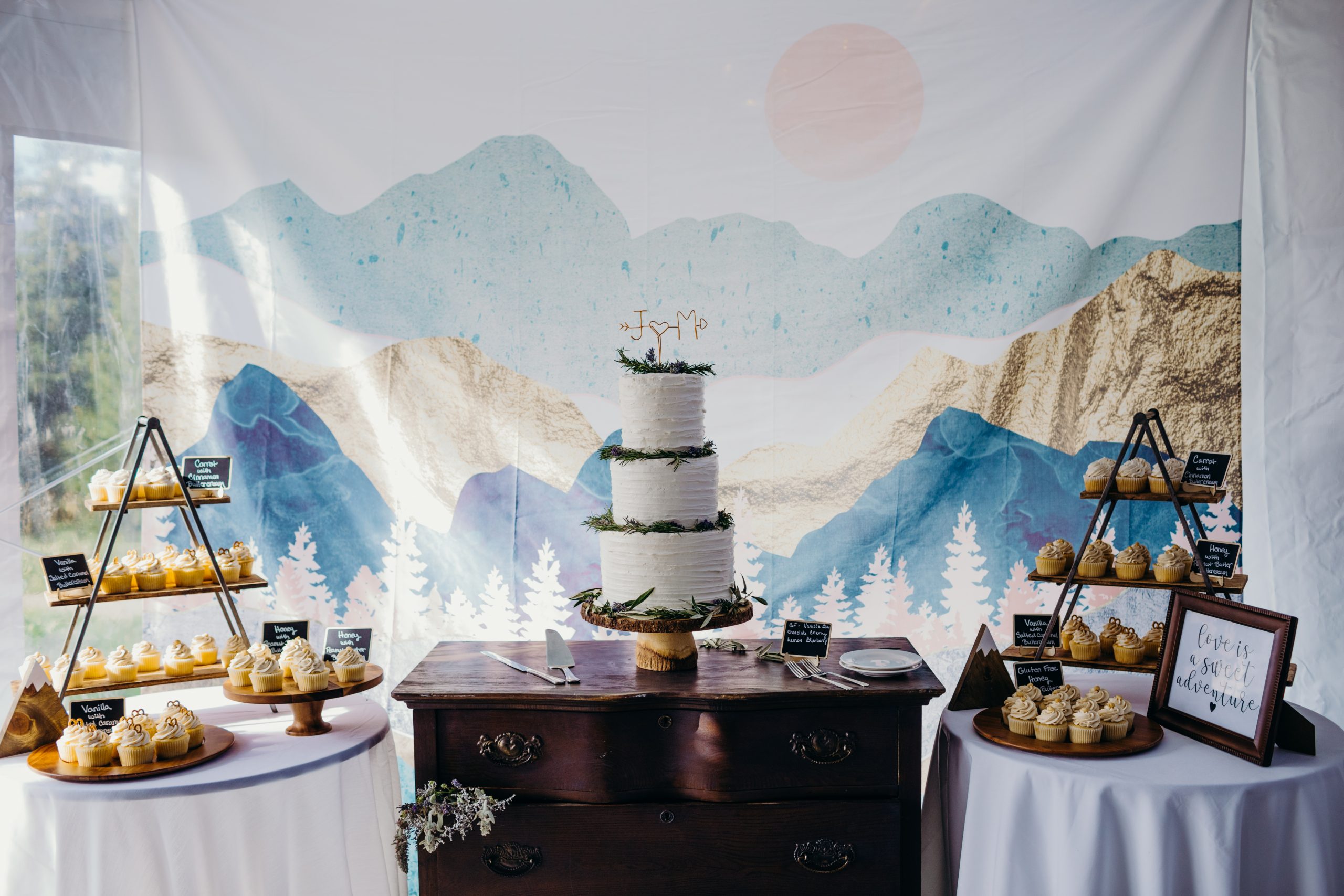 Cake table with mountain backdrop