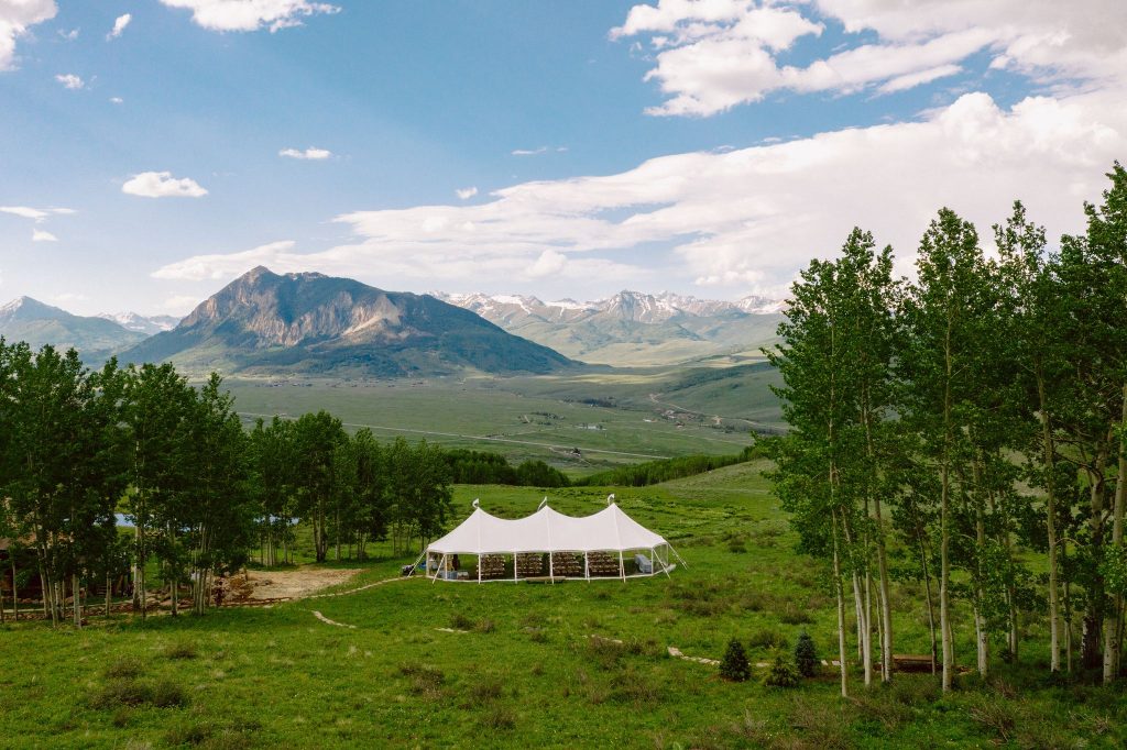Sailcloth wedding tent setup i the mountains of Crested Butte