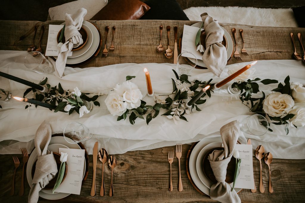 wedding dinner table with white linens