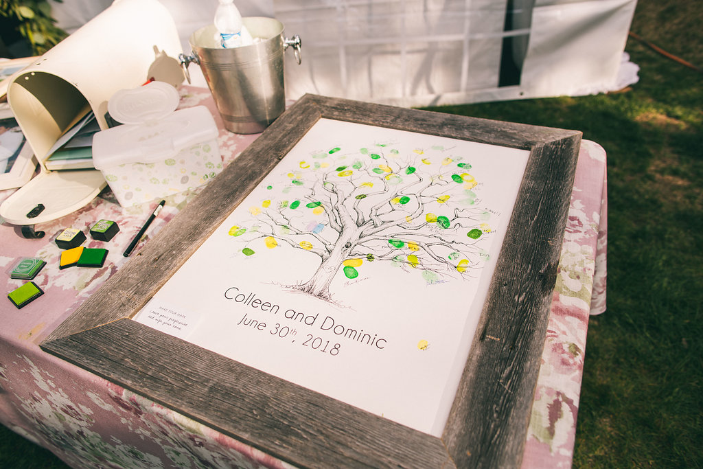Wedding guest book of finger prints on a tree