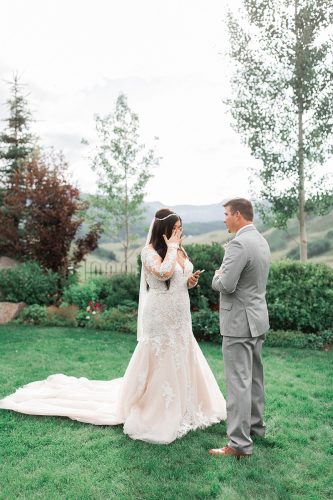 Devon + Billy Mountain Wedding Garden first look sharing personal vows before wedding ceremony